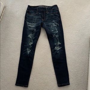 dark jeans with rips